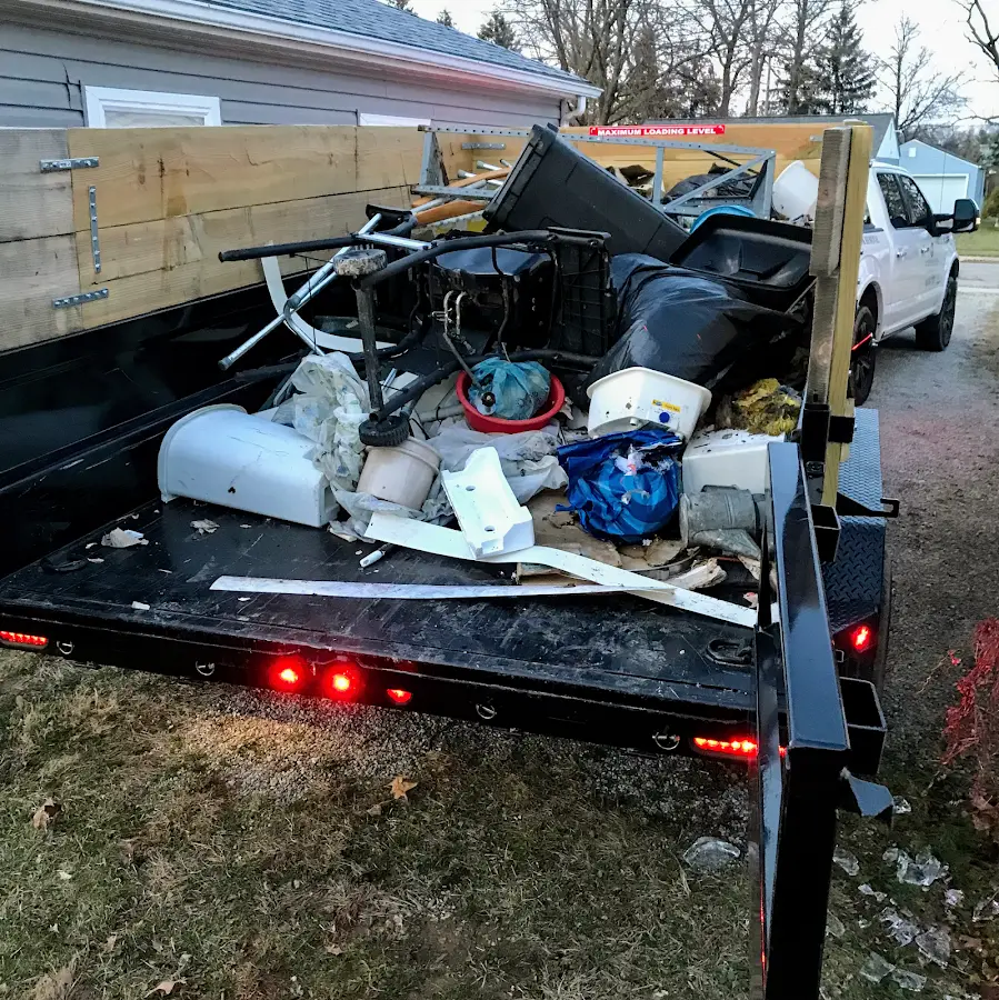 Roll-off dumpster delivered to a residential driveway in Fish Hawk